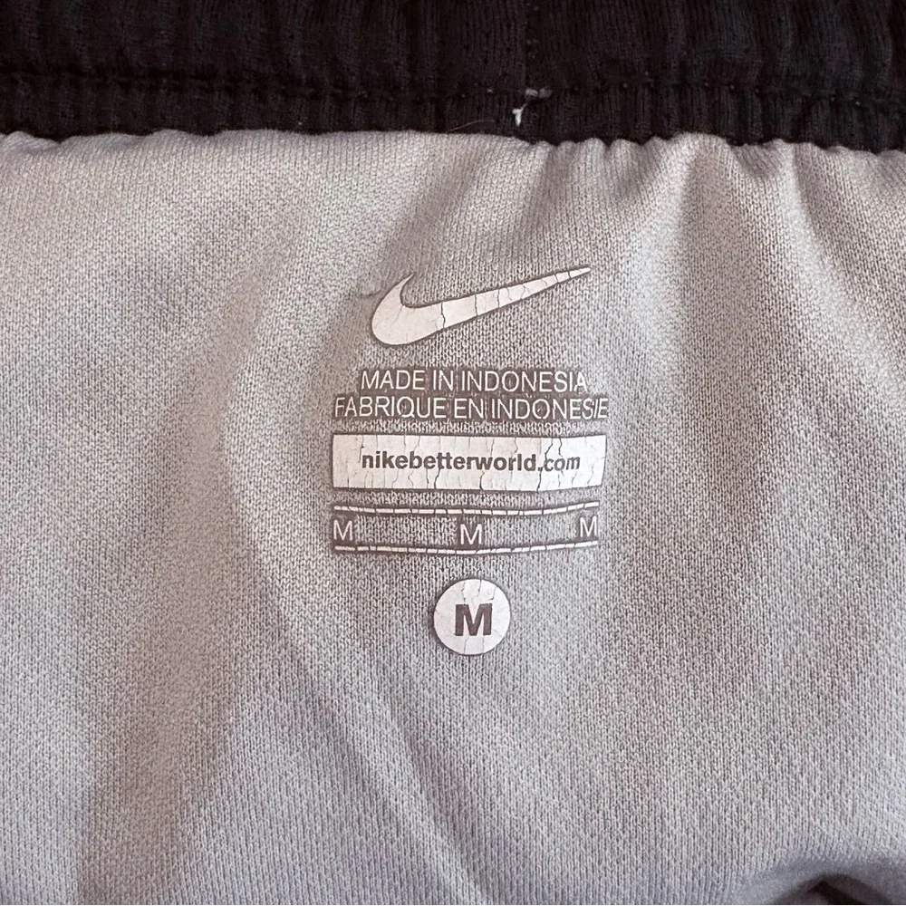 Nike Women's Medium Black and Gray Athletic Shorts